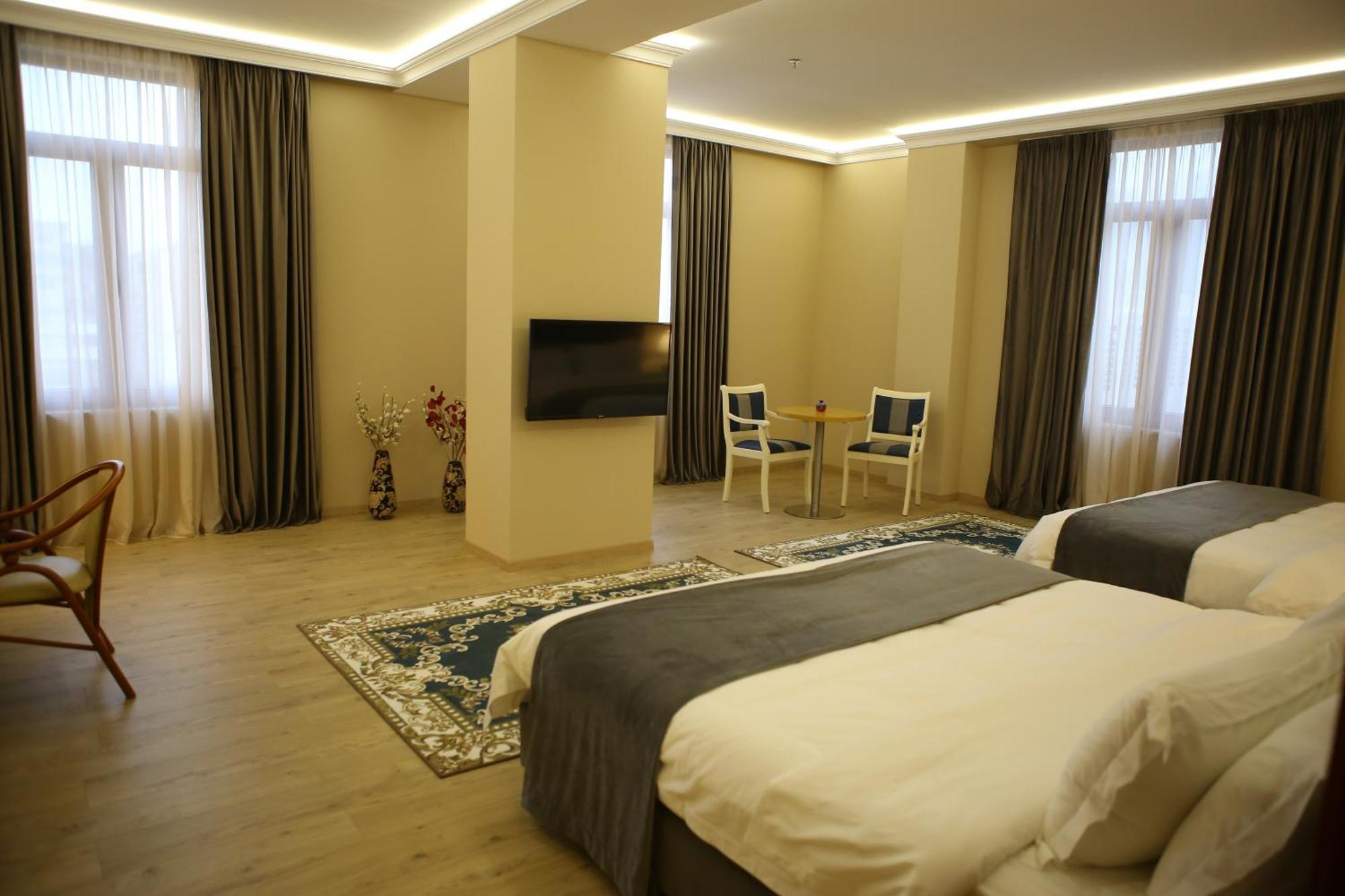 Hotel Colombo Berat Rom bilde A room at the hotel